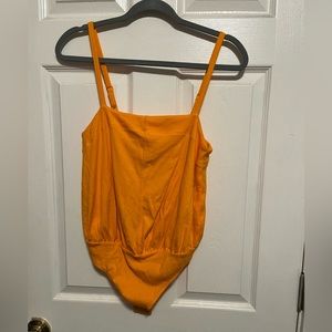Free People Orange BodySuit Size S BrandNew with Tag